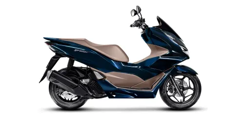 PCX azul vista lateral com destaque para alarme